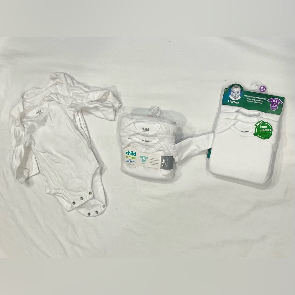 Nine longsleeved white onesies baby boy 0 to 3 months